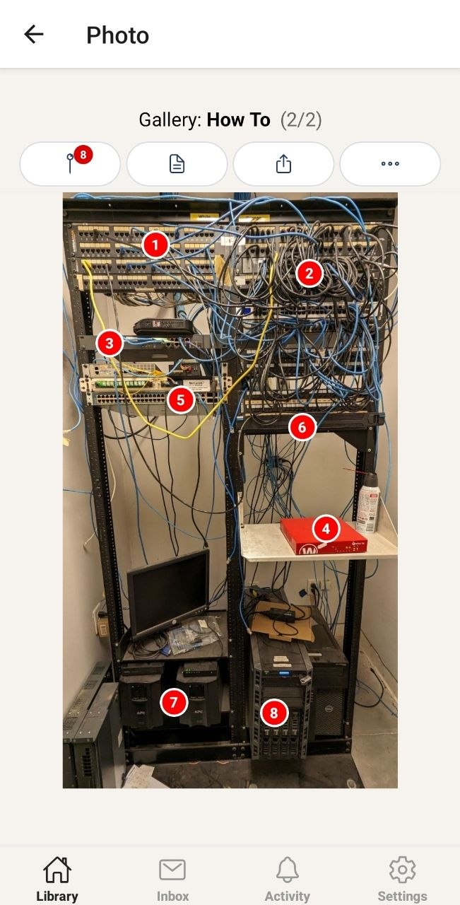 Server rack documentation photo with numbered pins and notes in PikTak